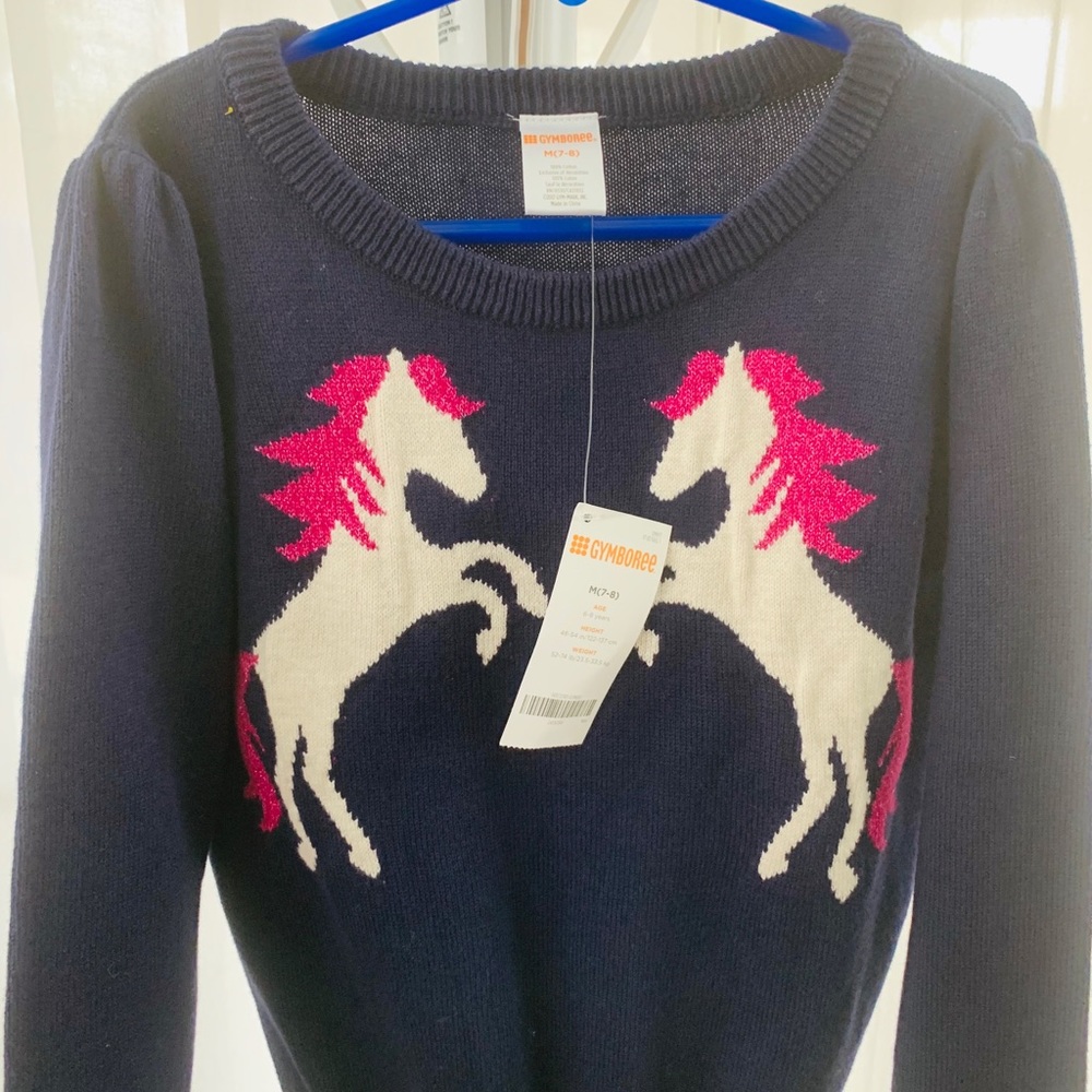 Dark blue sweater with horses